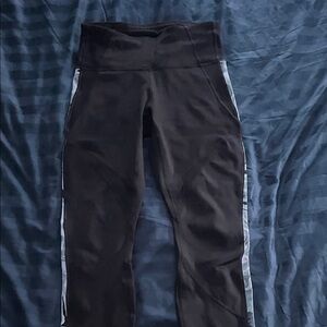 Athleta Black High-Waisted Leggings with Side Stripes